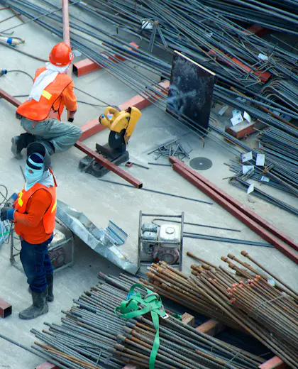 Workers in hi-vis on an active construction site